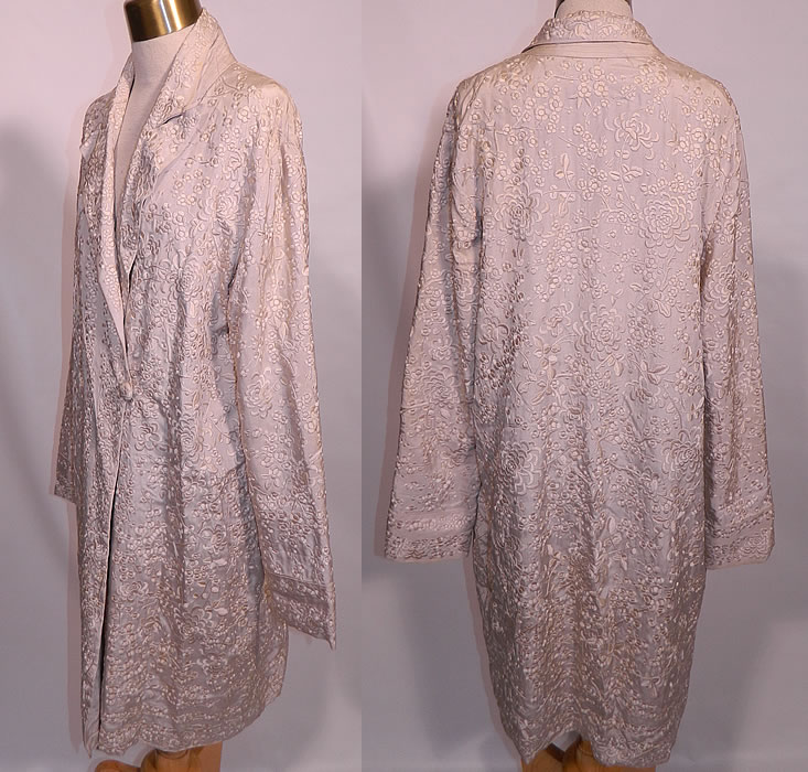 Vintage Chinese White Silk Floral Embroidered Piano Shawl Long Coat Jacket. The coat measures 38 inches long, with 48 inch hips, a 42 inch waist, 40 inch bust, 15 inch back and 24 inch long sleeves. It is in excellent condition. This is truly a wonderful piece of wearable Chinese embroidery textile art! 