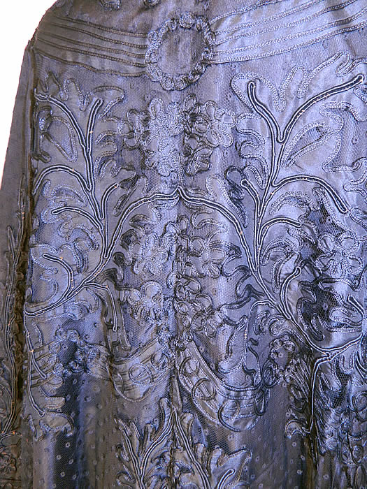 Edwardian Titanic Black Silk Soutache Applique Lace Long Coat Jacket. The coat measures 46 inches long, with 54 inch hips a 46 inch waist, 42 bust, 15 inch back and 23 inch long sleeves. 