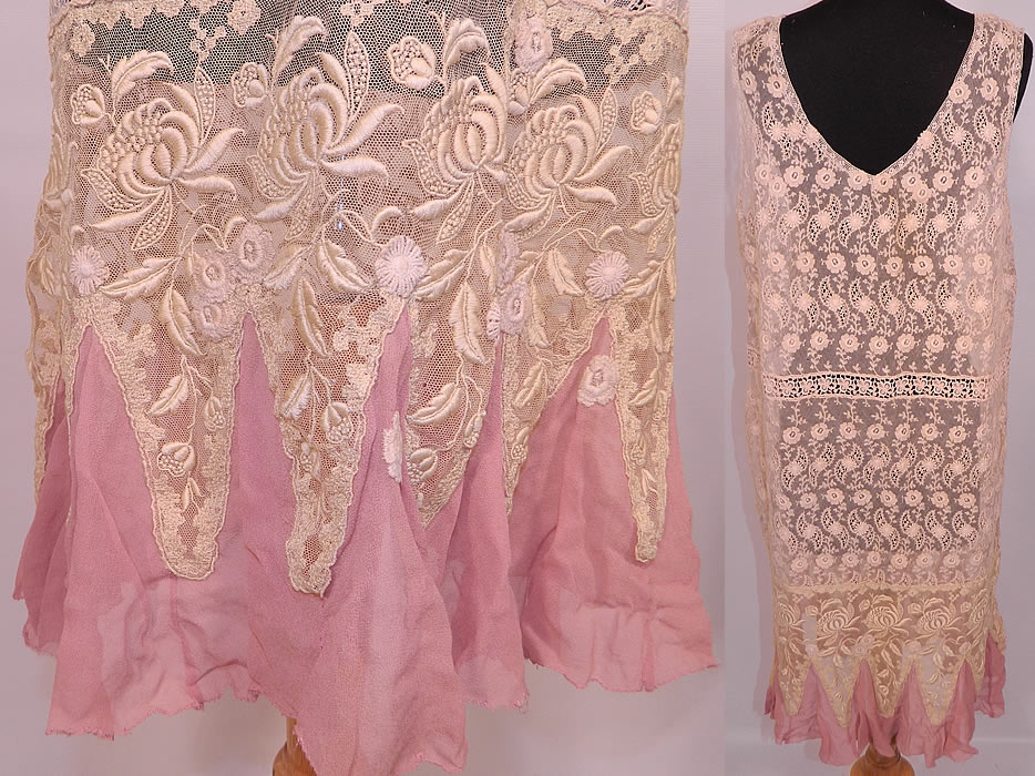 Vintage Cream  Embroidered Net Lace Drop Waist Pink Silk Hem Chemise Dress. The dress measures 41 inches long, with 40 inch hips, a 38 inch waist and 36 inch bust. It is in good condition, with several small lace applique patches trimming the bottom skirt. This is truly a wonderful piece of wearable lace art!