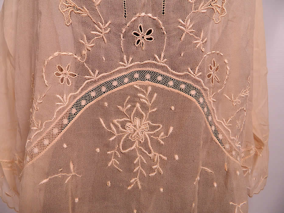 Vintage Peach Pastel Silk Chiffon Embroidered Drawn Work Lace Middy Blouse. This beautiful blouse middy top style shirt is loose fitting, has long 3/4 length full sleeves, a scoop neckline and side waist button trim closure. The blouse measures 24 inches long, with a 40 inch waist, 44 inch bust and 15 inch back.