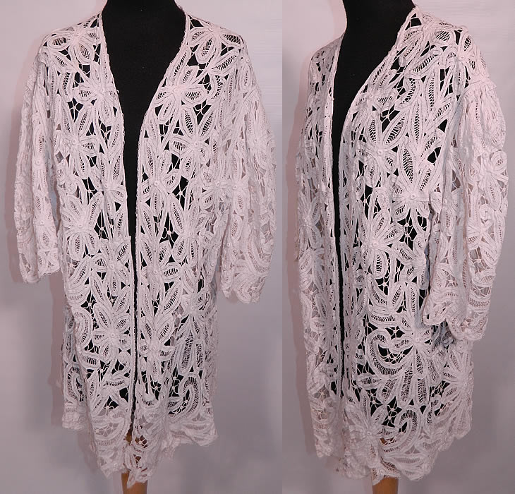 Edwardian Antique  White Battenburg Tape Lace Bell Sleeve Coat Jacket. This exquisite Edwardian era antique white battenburg tape lace bell sleeve coat jacket dates from 1910. It is made of an off white sheer filmy linen stitch, fine tape lace, with button hole stitching, connecting brides and bars done in a floral leaf design. 