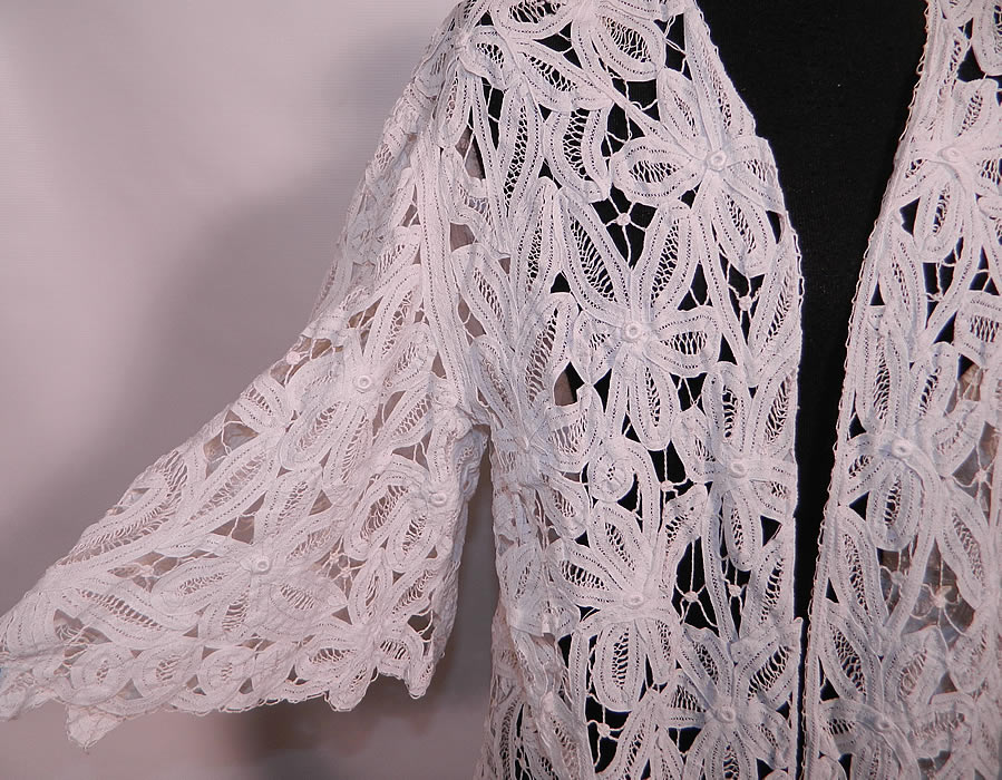 Edwardian Antique  White Battenburg Tape Lace Bell Sleeve Coat Jacket. This lovely lace long mid length coat jacket has a loose fitting style with an open front, full flared wide bell shape sleeves and is sheer, unlined.