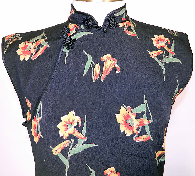 Vintage Chinese Cheongsam Orange Tiger Lily Flower Print Silk Crepe Qipao Dress. Manchu women wore a one-piece dress which were called "qipao" or "banner dress" and later became the traditional dress for Chinese women. The dress measures 41 inches long, with 30 inch hips, a 26 inch waist and 32 inch bust. It is in good condition. This is truly a wonderful piece of wearable Chinese textile art! 