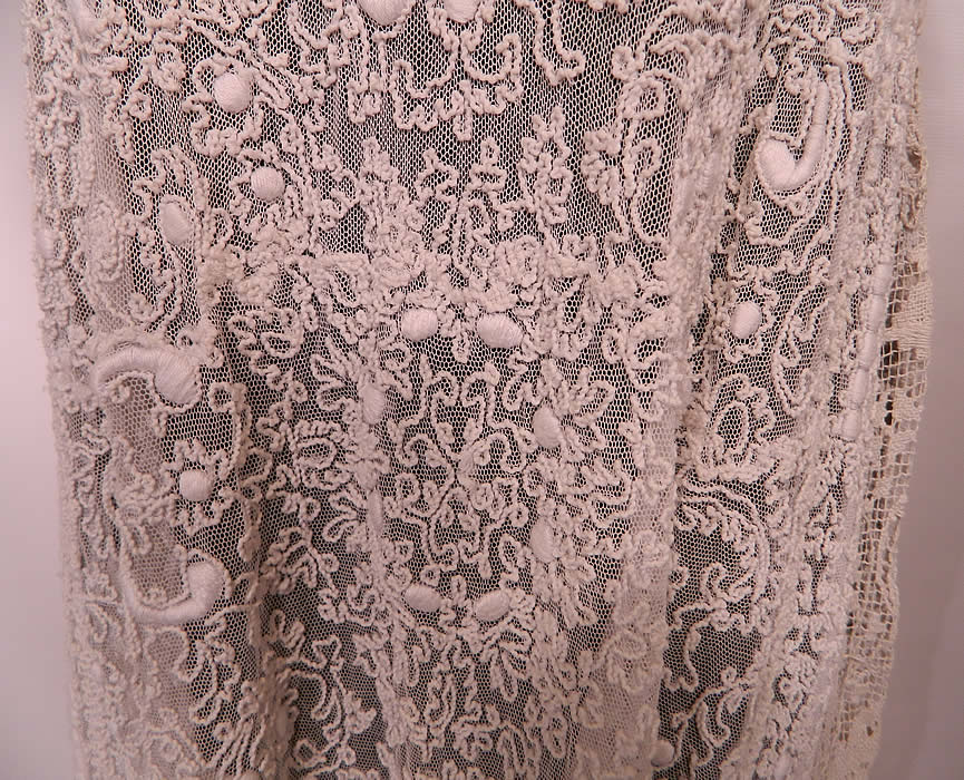 Edwardian White  Net Embroidered Soutache Crochet Filet Lace Dress. The dress is a large wearable size, measuring 52 inches long, with 42 inch hips, a 30 inch waist, 38 inch bust and 15 inch back. It is in excellent condition. This is truly an exceptional unique piece of antique wearable textile art! 
