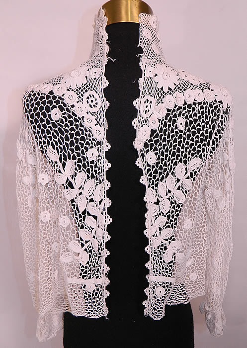 Edwardian Antique White Irish Crochet Tape Lace Bodice Blouse. It is in good condition, with a few small breaks in the connecting bride bars, a tiny rust spot stains on the collar and could be worn with the open front as a jacket. This is truly a extraordinary piece of wearable antique lace art! 