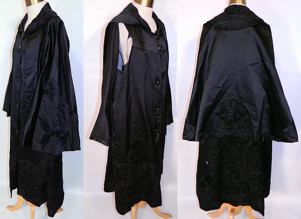 Vintage Black Silk Soutache Embroidered Opera Cloak Cape Coat Dress. This fabulous flapper evening opera coat dress is loose fitting, has a layered cloak cape back, rounded collar, an attached neck scarf tie sash with fringe ends, sleeveless, with carved black button closures down the front  and is fully lined. The coat measures 42 inches long, with 46 inch hips, a 42 inch waist and 40 inch bust.