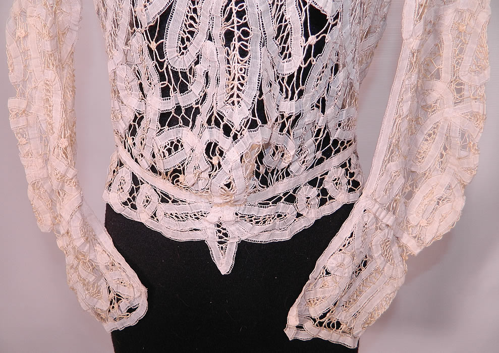 Victorian Antique  Cream Battenburg Tape Lace High Neck Collar Blouse Top. The top measures 18 inches long, with   a 26 inch waist, 36 inch bust, 14 inch back and 22 inch long sleeves.