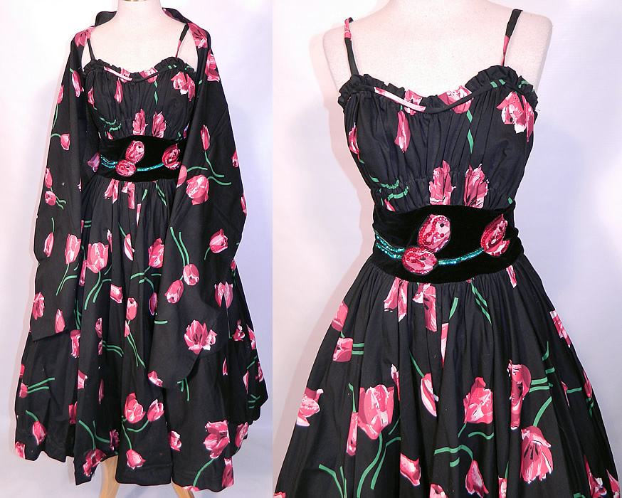 Vintage Black Pink Tulip Cotton Print Sequin Circle Skirt Dress & Stole Shawl. This vintage black pink tulip cotton print sequin circle skirt dress and stole shawl dates from the 1950s. It is made of a black cotton fabric background, with a pink floral tulip print design and a black velvet applique sequin beaded trim waistband.