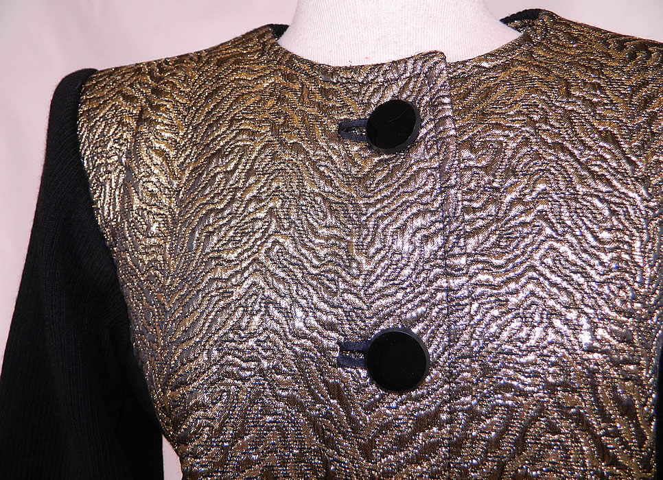 Vintage Saint Laurent Rive Gauche Gold Lamé Black Knit Suit Jacket. This beautiful designer suit jacket has broad shoulder padding, long fitted sleeves, black jet buttons for closure down the front and is fully lined.