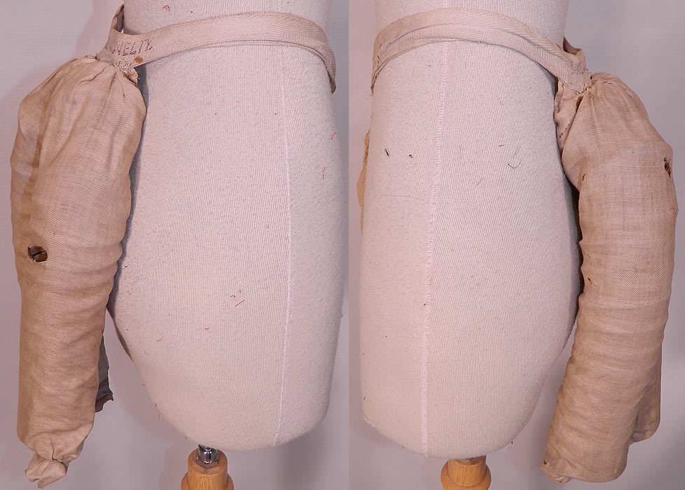 Victorian The Novelty Wire Spring Coil Crinolette Bustle Pad Support. This antique Victorian era The Novelty wire spring coil crinolette bustle pad support dates from 1880. It is made of an off white cream color cotton fabric, stuffed with 2 wire spring coils sewn inside creating a long double side by side bustle pad extender.