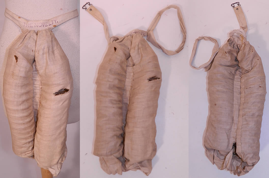 Victorian The Novelty Wire Spring Coil Crinolette Bustle Pad Support. The bustle pad measures 13 inches long, with a 31 inch waist. It is in as-is fair condition, with some age spot stains, frayed holes and a frayed open side seam. This is truly a rare and wonderful piece of wearable Victoriana art!