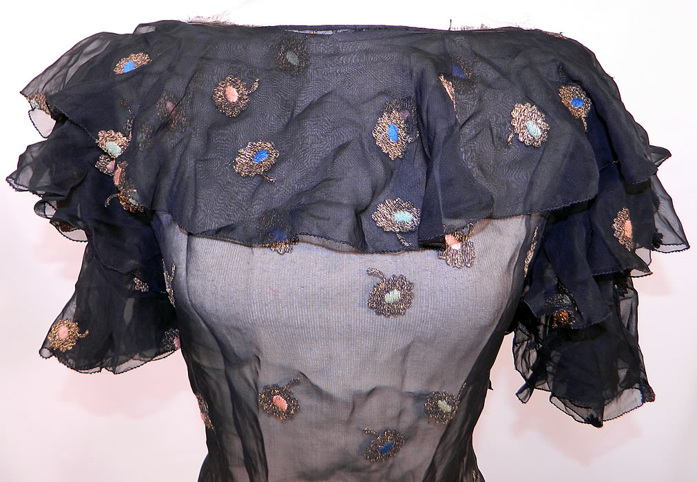 Vintage Gold Lam&eacute; Embroidered Black Silk Chiffon Bias Cut Evening Gown Dress. The dress measures 58 inches long, with 38 inch hips, a 30 inch waist and 38 inch bust.