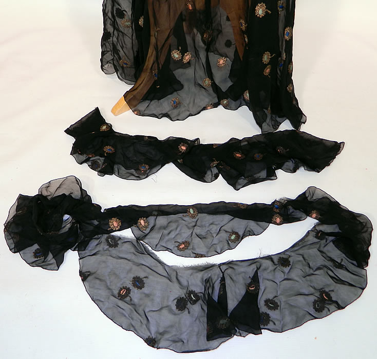 Vintage Gold Lam&eacute; Embroidered Black Silk Chiffon Bias Cut Evening Gown Dress. Included are two extra matching fabric  cut ruffle  trims, perhaps to be used on the neckline or bottom skirt. The dress is in good condition. This is truly a wonderful piece of wearable Art Deco textile art!  