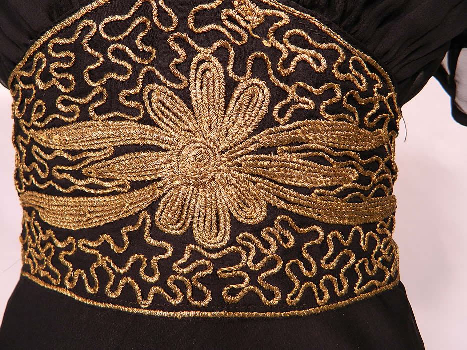 Vintage Black Silk Chiffon Gold Lamé Soutache Belted Evening Gown Dress & Slip. The dress measures 59 inches long, with 40 inch hips, a 28 inch waist and 38 inch bust. 