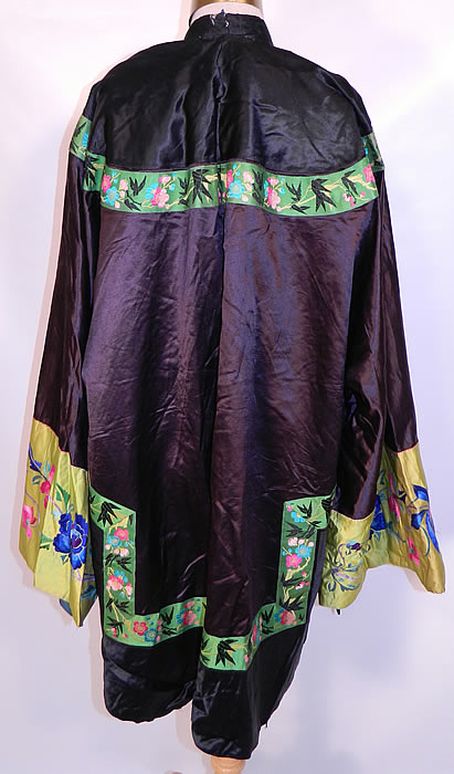 Antique Chinese  Silk Embroidered Peony Lotus Flower Sleeve Band Cuff Robe Coat. The robe measures 37 inches long, with 60 inch hips, chest, waist and a 28 inch sleeve cuff circumference.