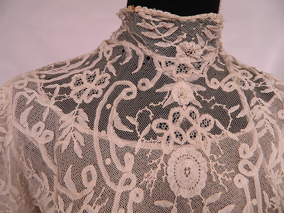 Victorian Princess  Brussels Bobbin Tape Lace White Net Shirt Blouse. It is made of a white sheer fine net mesh with fancy princess lace, battenburg tape lace, duchesse and mixed Brussels bobbin lace done in an appliqued spiraling floral vine leaf pattern design.