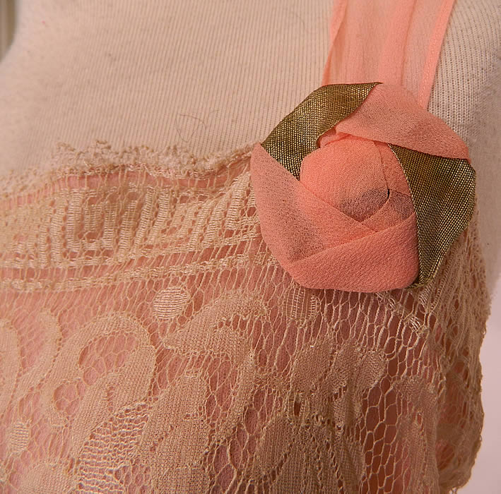 Vintage Cream Fringe Filet Lace Pink Silk Rosette Chemise Slip Flapper Dress. The dress measures 41 inches long, with 34 inch hips, a 32 inch waist and 34 inch bust. 