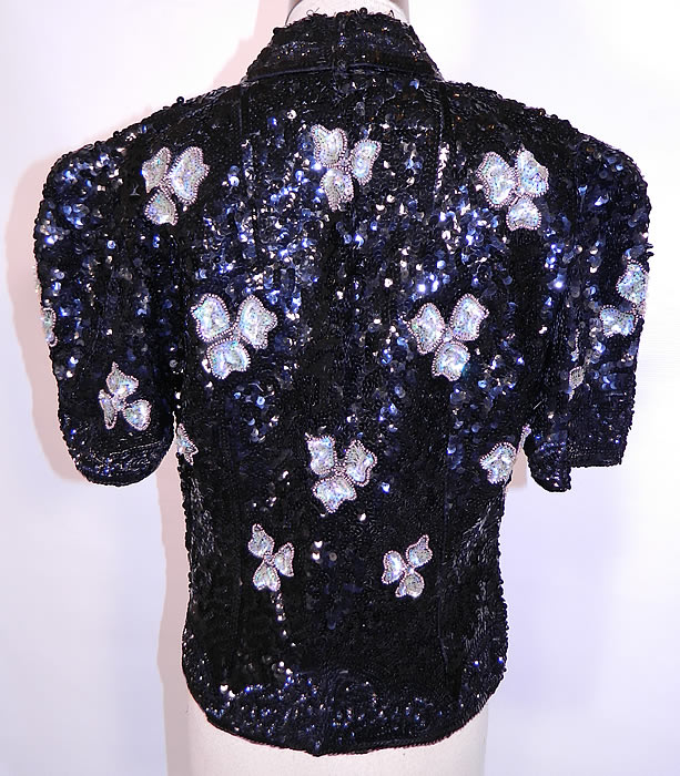 Vintage Black Net   Sequin Beaded Iridescent Gold Flowers Evening Jacket. It is in good condition. This is truly a wonderful piece of wearable beaded art! 