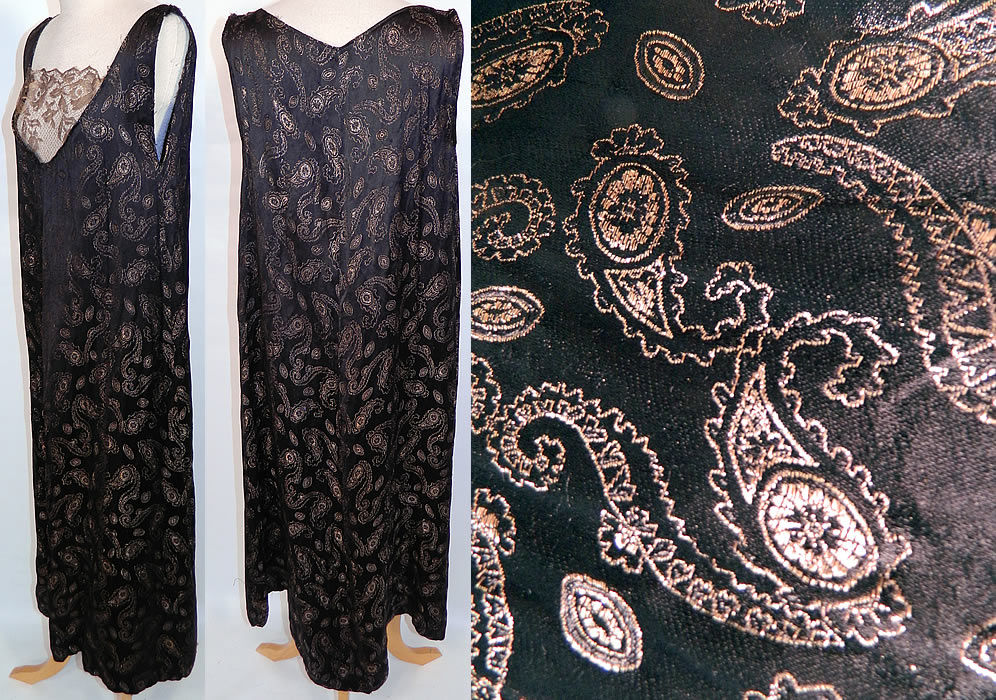 Vintage Art Deco Black Silk Gold Lamé Lace Paisley Boteh Dress Large Size. This fabulous flapper dress has a straight shift loose fitting, long drop waist style, sleeveless and unlined. The dress is a large size measuring 47 inches long, with 48 inch hips, a 42 inch waist and 38 inch bust. It is in good condition, with only a small frayed repair on one shoulder strap. This is truly a wonderful piece of wearable Art Deco textile art!