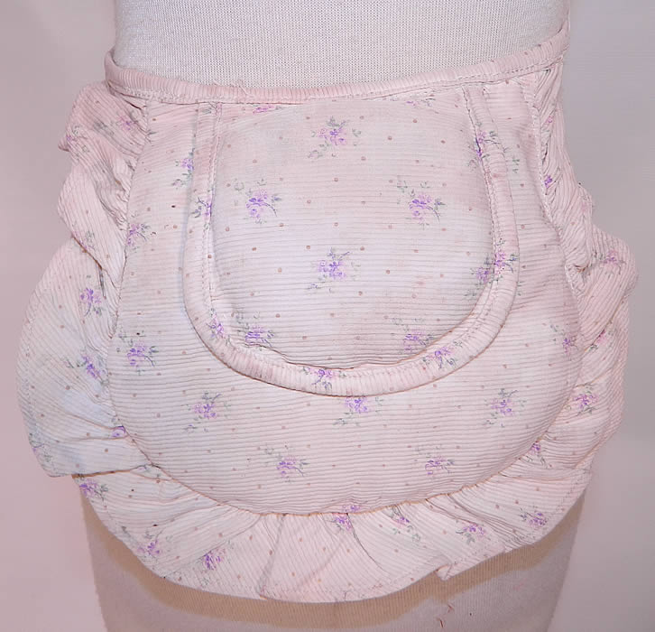 Victorian White Cotton Pique Purple Violet Polka Print Crinolette Bustle Pad Support. This antique Victorian era white cotton pique purple violet polka dot print crinolette bustle pad support dates from 1880. It is made of a white cotton pique ribbed textured fabric, with a purple violet flower, tiny gold polka dot print design, stuffed with horse hair and quilted stitching.