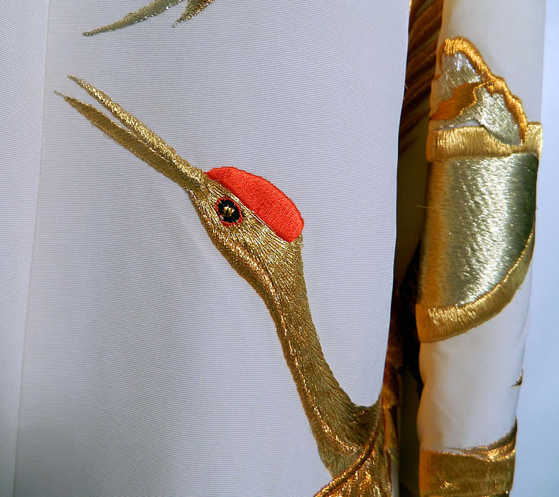 Vintage Profils Japanese Uchikake Wedding Kimono Gold Crane  Embroidered Coat. The crane is a symbol of luck, longevity and fidelity. This magnificent unique uchikake wedding kimono fabric has been recreated into a long floor length evening coat, with a fold over collar, long full sleeves, open front with no closure and  is fully lined.