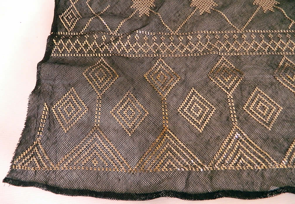 Vintage Art Deco Egyptian Assuit Black Net Silver Shawl Scarf Large Size. There is a hand stitched rolled hem edging, which has become unraveled in areas (see close-up). It is in good condition, with only some faint fade discoloration staining near the center. This is truly an exceptional, heavy, quality, one of a kind piece of wearable Egyptian textile art! 