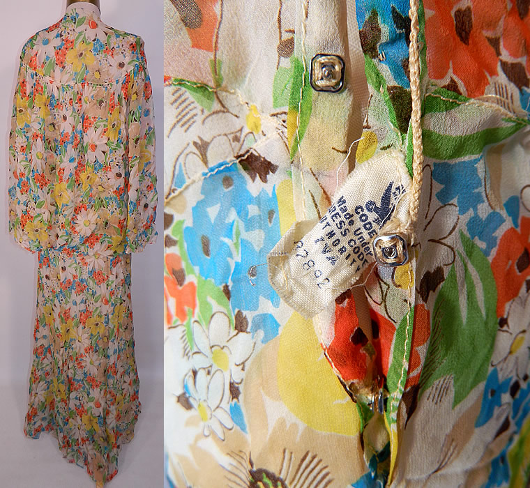 Vintage Daisy Flower Print Silk Chiffon Belted Bias Cut Dress Slip Cloak Cape. The cape measures 26 inches long, with a 80 inch bottom circumference. It is in good condition, but does have a small frayed hole on the shoulder. This is truly a rare and wonderful complete ensemble piece of wearable art!