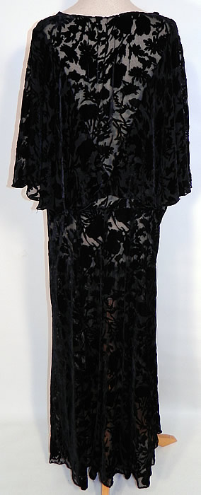 Art Deco Vintage Black Silk Burnout Voided Velvet Bias Cut Cape Dress. This beautiful bias cut dress evening gown is a long floor length, with an attached capelet sleeve shawl back and is sheer, unlined.