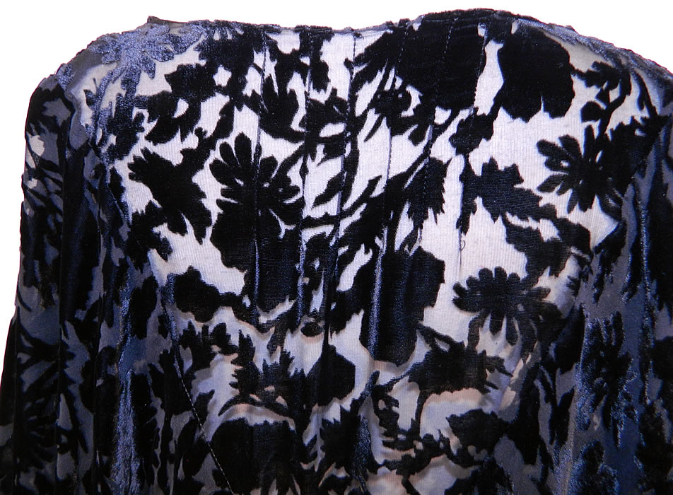 Art Deco Vintage Black Silk Burnout Voided Velvet Bias Cut Cape Dress. The dress is a large size measuring 51 inches long, with 50 inch hips, a 38 inch waist and 42 inch bust. It is in good condition. This is truly a wonderful piece of Art Deco wearable textile art!
