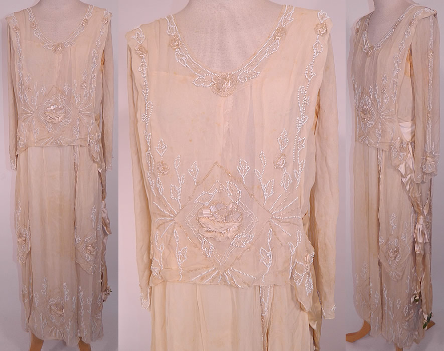 Edwardian Cream Silk White Beaded Rosette Belted Wedding Gown Dress. This antique Edwardian era cream silk white beaded rosette belted wedding gown dress dates from 1915. It is made of a cream silk fabric, with white crystal beading and silk raised rosette rose flower trim.