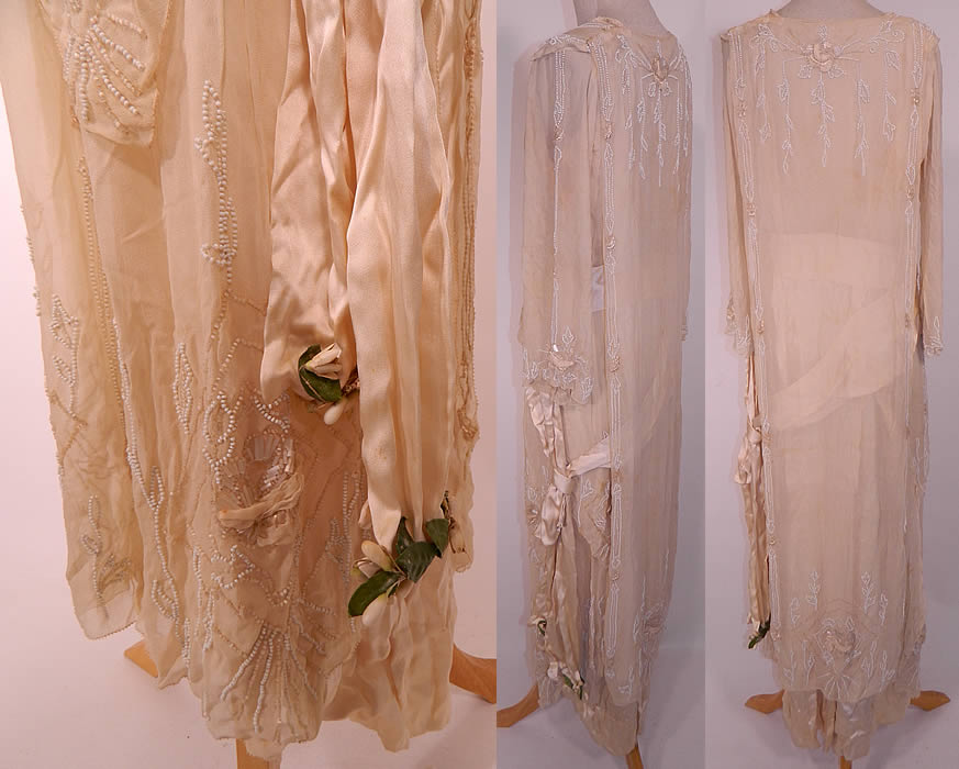 Edwardian Cream Silk White Beaded Rosette Belted Wedding Gown Dress. he dress measures 52 inches long, with 38 inch hips, a 28 inch waist and 36 inch bust. 