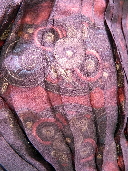 Vintage Aubergine Silk Velvet Embroidered Applique Trim Drop Waist Dress. The dress measures 40 inches long, with 36 inch hips, a 36 inch waist, 36 inch bust, 14 inch back and 25 inch long sleeves. It is in good condition, with only some small frayed holes in the silk chiffon sleeves. This is truly a wonderful piece of wearable Art Deco textile art! 