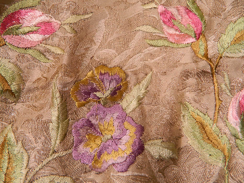 Vintage Embroidered Pink Roses Purple Pansies Silver Lame Lam&eacute; Cream Silk Shawl. This sensational shawl cape like wrap measures 50 by 34 inches, with a 10 inch border trim edging. 