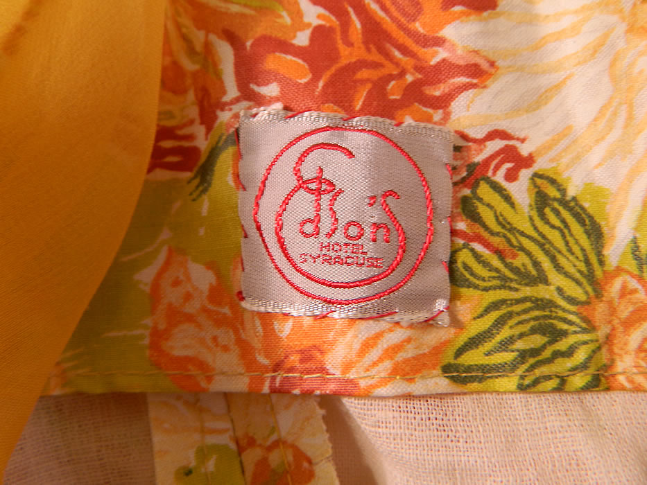 Vintage Edson's Hotel Syracuse Yellow Chiffon Scarf Floral Print Cotton Circle Skirt Dress.  There is a "Edson's Hotel Syracuse" label sewn inside. The dress measures 42 inches long, with 40 inch hips, a 24 inch waist and 36 inch bust. It is in good condition. This is truly a wonderful piece of wearable art! 