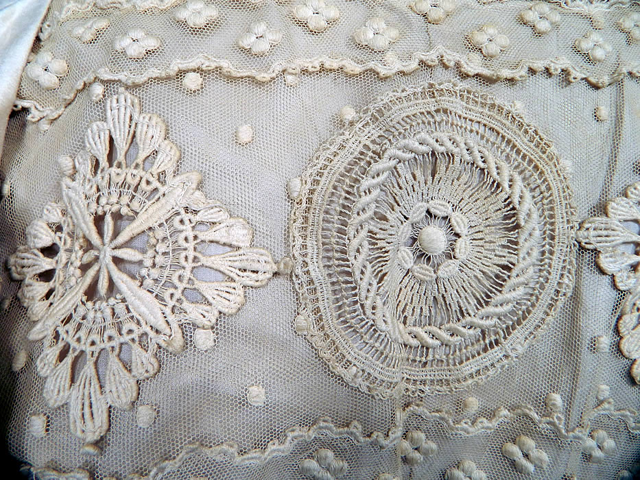Edwardian Embroidered Polka Dot Cream Net Lace Wedding Dress Blouse Skirt. The top measures 15 inches long, with a 24 inch waist, 34 inch bust and 12 inch back. There is matching fabric, long floor length full skirt, with gathered back drape, hook closures and is fully lined with a silk petticoat sewn inside and bottom ruffle hem. 