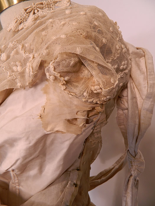 Edwardian Embroidered Polka Dot Cream Net Lace Wedding Dress Blouse Skirt. The skirt measures 43 inches long, with a 22 inch waist. It is in good condition, but has not been cleaned, with several small faint age spot stains and underarm discoloration with fraying on the inside silk lining (see close-up). This lovely lace  wedding dress is truly a wonderful piece of wearable antique bridal textile art! 