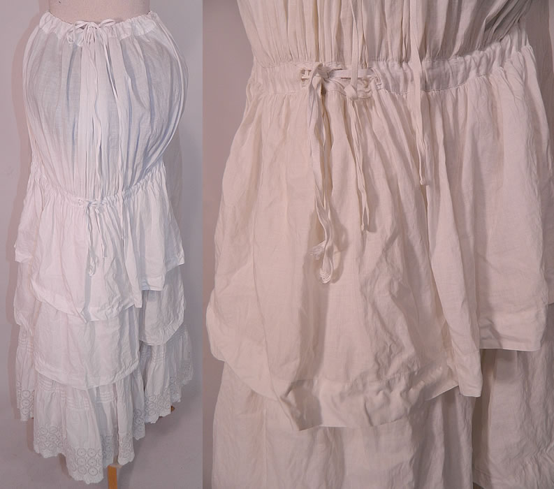 Victorian White Cotton Eyelet Lace Gathered Ruffle Bustle Back Petticoat Skirt. This beautiful bustle petticoat underskirt has a layered tiered ruffle bustle back, with an adjustable drawstring gathering on the back midway down and an adjustable drawstring waist.