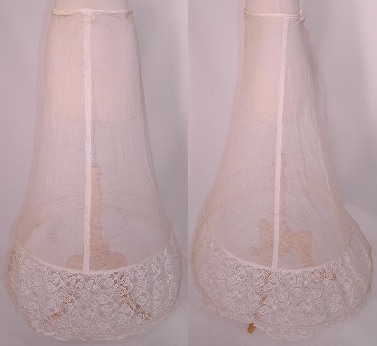 Vintage White Lace Crinoline Net Bell Shape Bridal Wedding Petticoat Hoop Skirt. This vintage white lace crinoline net bell shape bridal wedding petticoat hoop skirt dates from the 1940s. It is made of an off white cream color sheer cotton net fabric, with a crinoline wired hoop bottom covered with white lace trim.