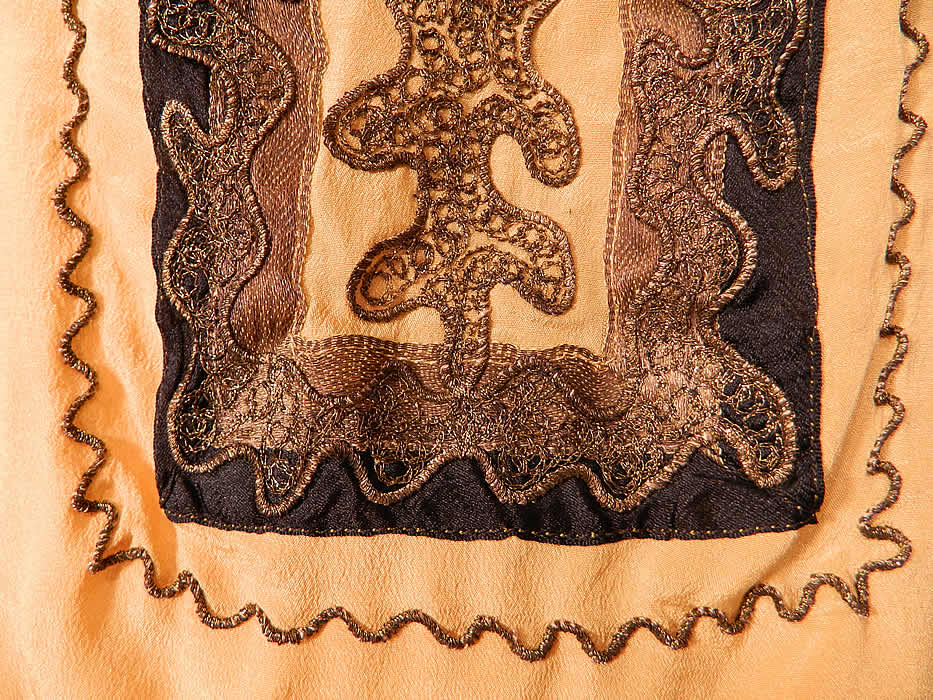 Vintage Art Deco Yellow Silk Black Applique Gold Lame Lamé Embroidered Flapper Blouse. It is made of a yellow silk crepe fabric, with black and gold lamé appliques and soutache embroidery work done in Art Deco abstract geometric designs on the front. 