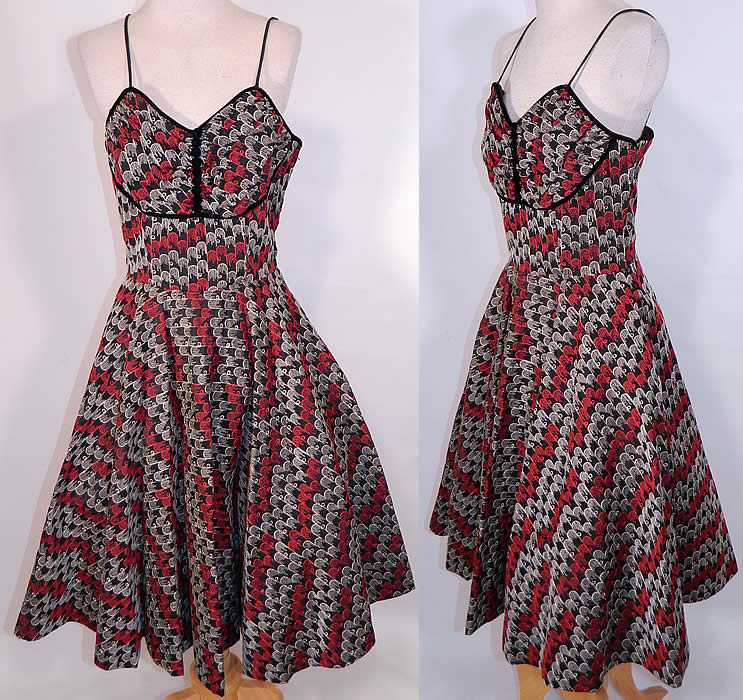 Vintage Red Black White Eyelet Embroidered Stitching Circle Skirt Dress & Shrug Jacket.It is made of a black nylon rayon fabric, with red & white raised stitching soutache embroidery eyelet cut work done in a decorative design.