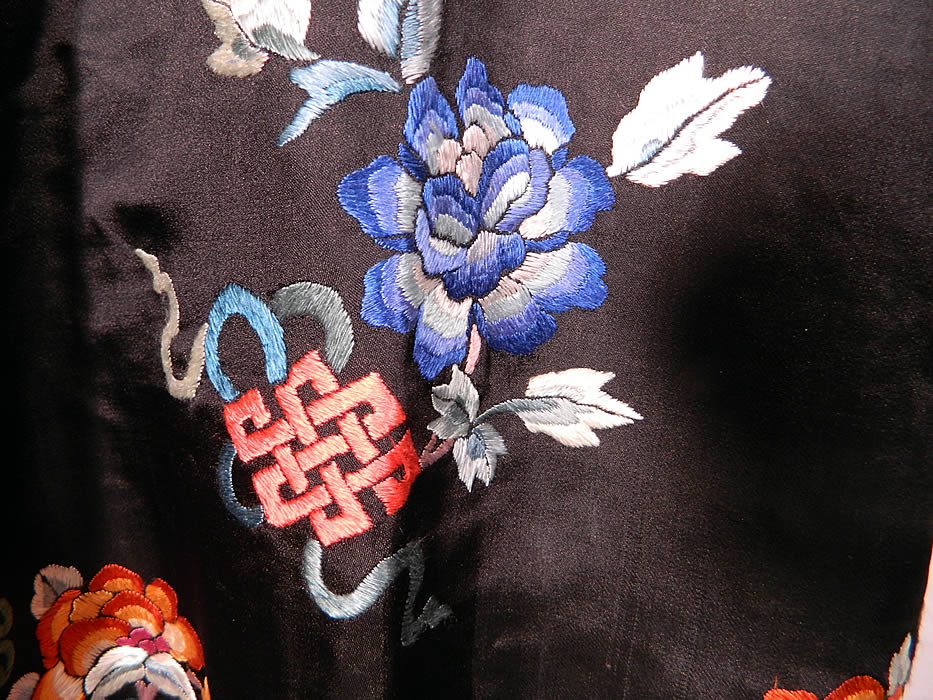 Antique Chinese Silk Embroidered Butterfly Endless Knot Peony Flower Robe Coat. The robe measures 42 inches long, with 46 inch hips, a 46 inch waist and 46 inch chest. It is in excellent condition. This is truly a wonderful piece of wearable antique Chinese textile art! 