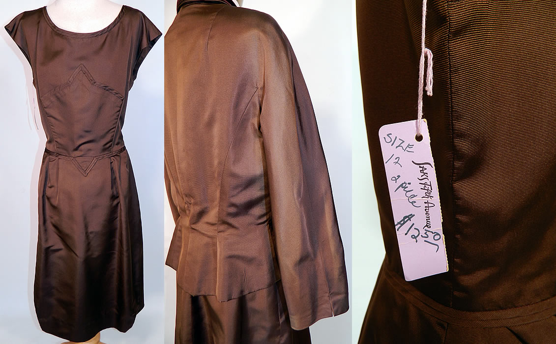 Vintage Hattie Carnegie Chocolate Brown Grosgrain Silk Suit Jacket & Dress. The dress measures 42 inches long, with 40 inch hips, a 28 inch waist and 36 inch bust. There is a matching fabric tailored suit jacket, with a brown velvet trimmed collar, applique trim front, shoulder padding, long sleeves, peplum skirted waist, silk button front closure and is fully lined.