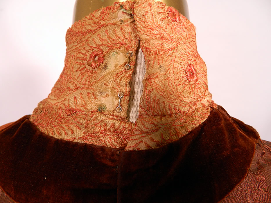 Edwardian Brown Silk Damask Floral Brocade Embroidered Lace High Collar Dress Gown. It is in good condition, but has not been cleaned, with slight underarm discoloration and some small frays on on the back net collar (see close-up). This is truly a wonderful quality custom made piece of wearable art.