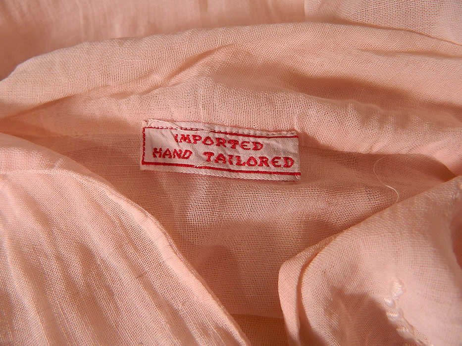 Vintage Pink Cotton White Embroidered Drawn Work Boho Peasant Drop Waist Dress. There is a "Imported Hand Tailored" label sewn inside the back neck. 
