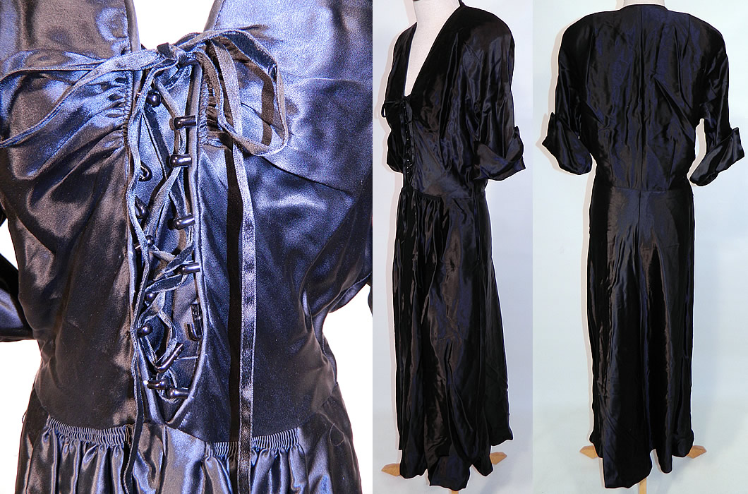 Vintage Black Silk Satin Corset Lace-up Front Neckline Evening Gown Dress. The dress measures 50 inches long, with a 26 inch waist, 36 inch bust and 15 inch back. It is in good condition, has not been cleaned. This is a wonderful piece of wearable art!