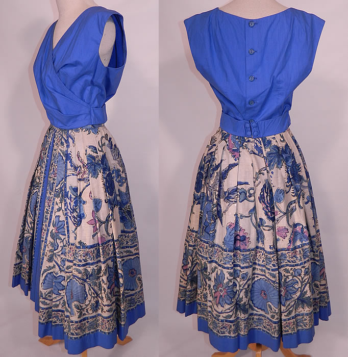 Vintage Tabak of California Sanganer India Hand Block Print Cotton Circle Skirt Dress. This sensational summer sun dress two piece outfit has a blue blouse top, with a wrap front style, attached sash belt with hooks on the back, sleeveless and button back closures.