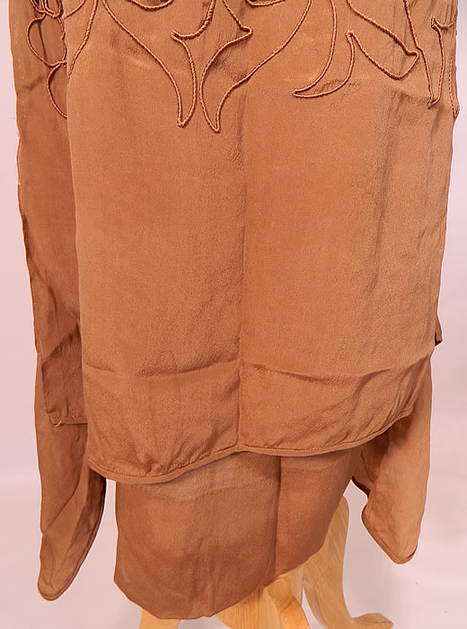 Vintage Beige Silk Soutache Cut Work Lace Drop Waist Shift Dress & Slip. The dress measures 48 inches long, with 36 inch hips, a 36 inch waist and 36 inch bust. Included is a matching beige color silk fabric chemise slip. The slip measures 47 inches long, with 38 inch hips, a 36 inch waist and 34 inch bust. The outfit is in good condition, the only a tiny pin hole on the dress shoulder and a few faint small water spot stains on the bottom back skirt of the dress (see close-up). This is truly a wonderful piece of wearable art! 