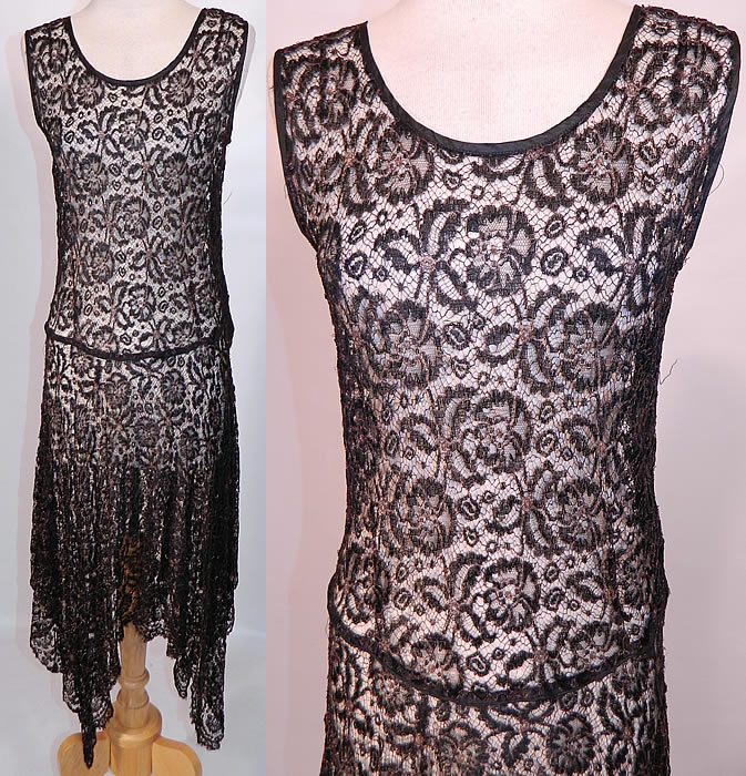Art Deco Black Gold Lamé Lame Lace Handkerchief Skirt Drop Waist Dress. This amazing Art Deco vintage black gold lamé lace handkerchief skirt drop waist dress dates from the 1920s. It is made of a sheer black lace fabric with gold metallic lamé thread woven through it outlining the polka dot, floral leaf pattern design.