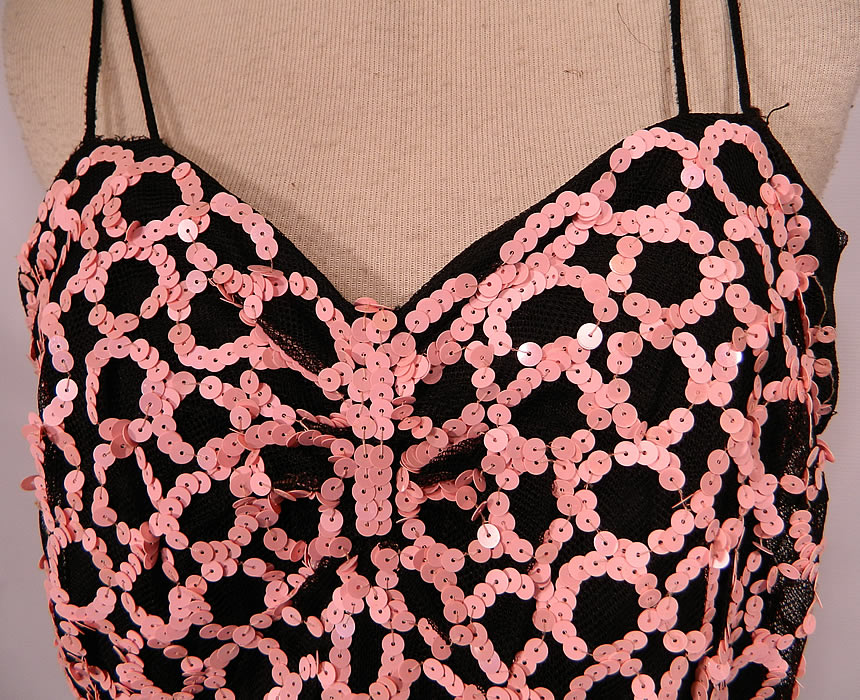 Vintage Black Tulle Net Pink Sequin Beaded Formal Evening Gown Dress. This fabulous formal, elegant evening gown is a long floor length, with double spaghetti straps, a sweetheart neckline, long flowing layered net skirt, side zipper closure and is fully lined with a silk slip sewn inside. 