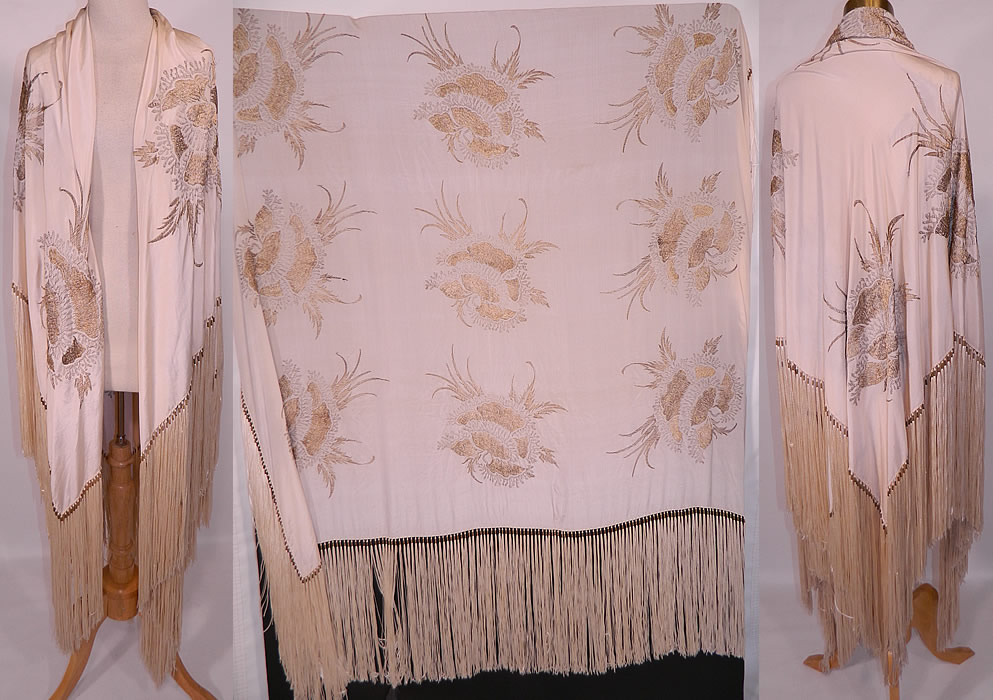 Vintage Silver & Gold Lame Lam&eacute; Cream Silk Fringe Flapper Piano Shawl. This vintage antique silver and gold lam&eacute; cream silk fringe flapper piano shawl dates from the 1920s. It is made of an off white cream color silk fabric, with silver and gold metallic lam&eacute; threads woven into the fabric creating a floral damask brocade pattern.